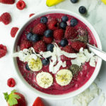 Smoothie bowl with banana, raspberries and blueberries