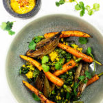 Tasty red lentil salad close up with kale, carrots and vegan mango mayo