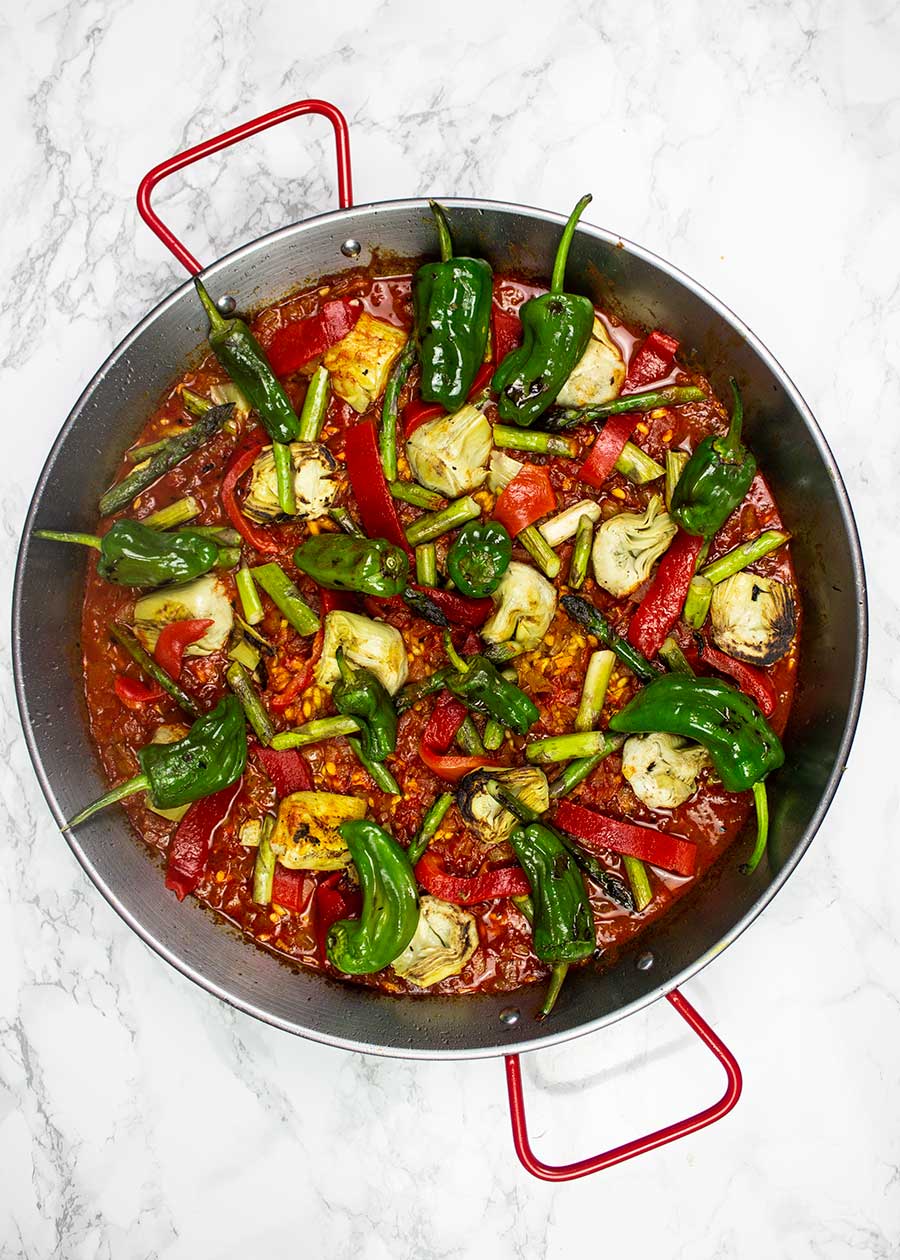 Making vegan paella with vegetables