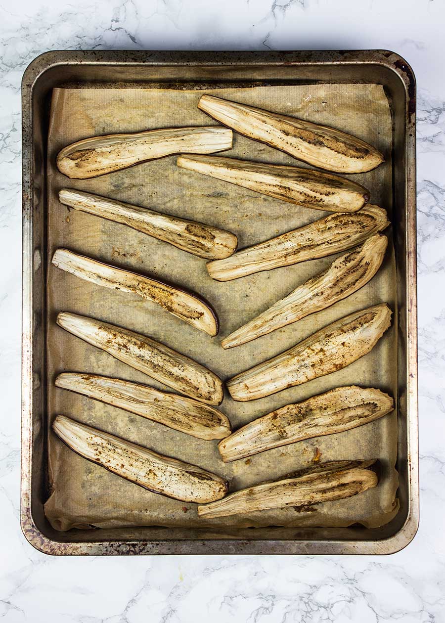 Slow roasting eggplant slices